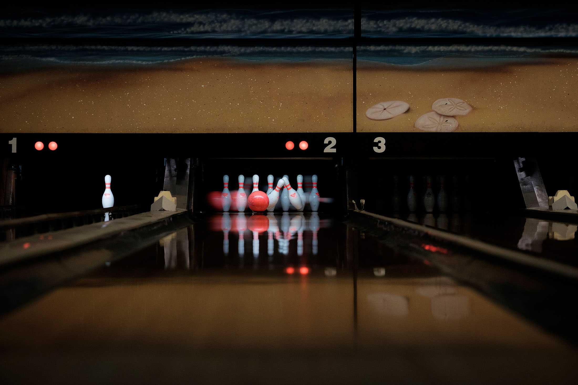 Photo of bowling pins at a bowling alley